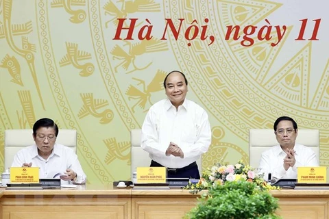 Réunion sur l’édification et le perfectionnement de l'État de droit socialiste au Vietnam