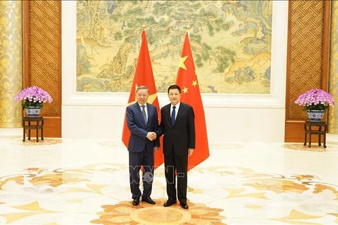 Le ministre To Lam en visite officielle en Chine et à une conférence ministérielle sur la lutte contre la criminalité 
