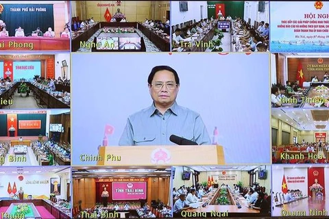 Le PM Pham Minh Chinh préside la conférence en ligne sur la lutte contre la pêche INN