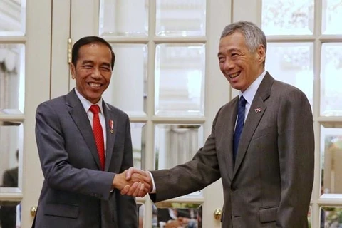 Singapour et l'Indonésie atteignent un cadre sur l'espace aérien et l'entraînement militaire