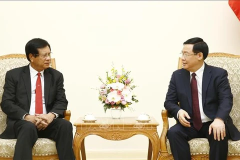 Vietnam et Laos partagent des expériences dans le développement des coopératives