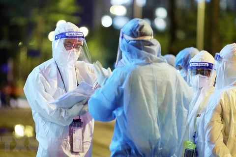 Des "soldats" en blouses blanches sur le front de la lutte contre l'épidémie de COVID-19