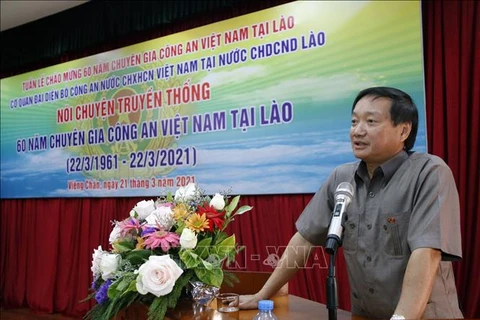 Rencontre à l'occasion des 60 ans d'activités des spécialistes vietnamiens en Police au Laos