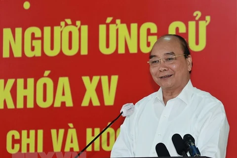 HCM-Ville: le président Nguyen Xuan Phuc reçoit des dignitaires religieux du district de Hoc Mon