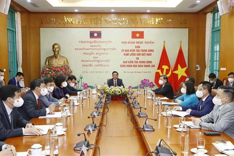 Vietnam-Laos: entretien en ligne entre les Commissions centrales de contrôle du PCV et du PPRL
