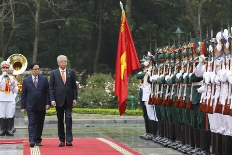 Cérémonie d'accueil du Premier ministre malaisien au Vietnam