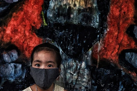 Un cliché d’un photographe du journal Lao Dong présenté au salon “Connected World: 2020”