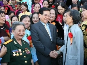 Le président pour un rôle accru des femmes 