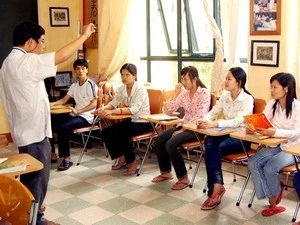 Formation professionnelle pour les jeunes malentendants. (Photo: Dinh Tran/AVI)