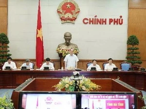 Le vice-Premier ministres Nguyen Thien Nhan préside la conférence. (Source: VNA)