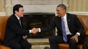Les présidents vietnamien et américain Truong Tan Sang et Barack Obama (Source : AFP)