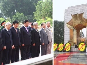 Les dirigeants du Parti et de l'Etat au Mémorial des Héros morts pour la Patrie. (Photo: Trong Duc/VNA)