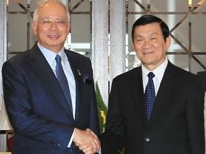 Le Premier ministre malais Najib Tun Abdul Razak et le président Truong Tân Sang, septembre 2011. (Source: VNA)