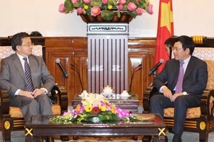 Le vice-Premier ministre Pham Binh Minh reçoit le vice-ministre chinois des Affaires étrangères, Liu Zhenmin. (Source: VNA)