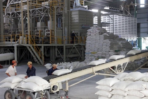 L’objectif de 2014 est d’exporter 7 millions de tonnes de riz. Photo : VNA