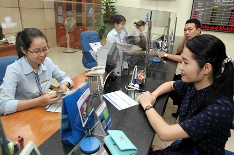 Fin mai, le volume de devises transférées à Hô Chi Minh-Ville s’élevait à 1,6 milliard. Photo : Trân Viêt/VNA