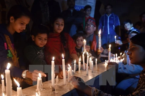 Commémoration des victimes à Peshawar. (Source: AFP/VNA)