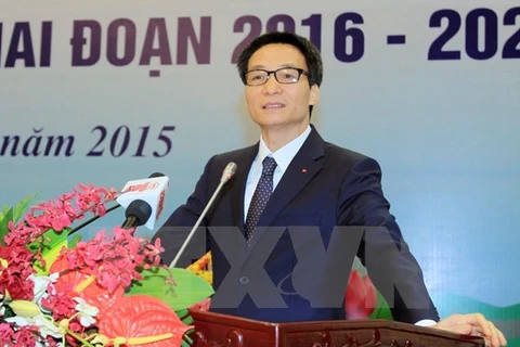 Le vice-Premier ministre Vu Duc Dam s'adresse lors de la visioconférence organisée le 21 janvier à Hanoi. Photo: VNA