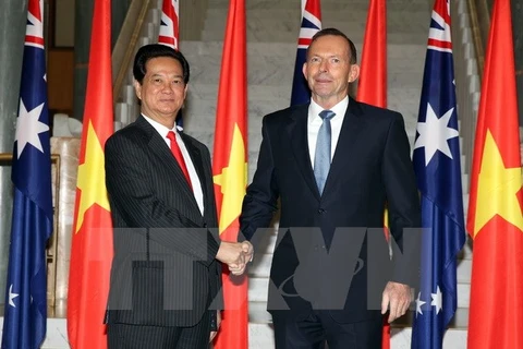 Le Premier ministre Nguyen Tan Dung et son homologue australien Tony Abbott . (Source: VNA)
