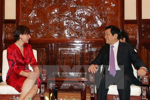 Le président Truong Tan Sang et l'ambassadeur italien au Vietnam, Mme Cecilia Piccioni. (Source: VNA)