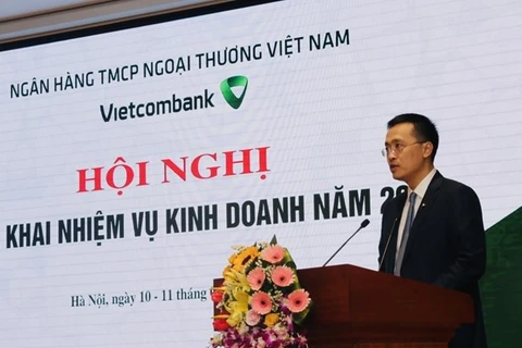 Генеральный директор Vietcombank Фам Куанг Зунг выступает на конференции 10 января (Фото: ВИА)