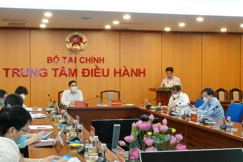 Конференция с министерствами и ведомствами на тему «Оценка освоения государственного инвестиционного капитала из иностранного капитала в течение 5 месяцев и меры по ускорению его освоения в 2021 году» 11 июня. (Фото: Vietnam+)