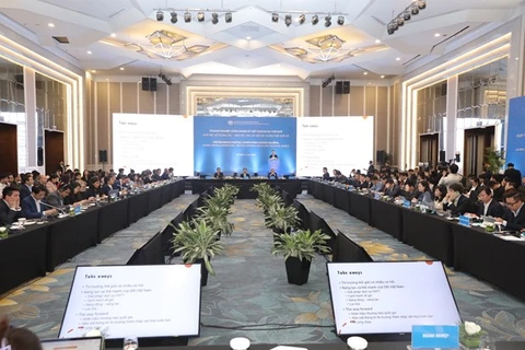 Конференция «Вьетнамские предприятия цифровых технологий завоевывают мир». (Фото: Vietnam+)