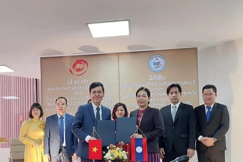 Архивные органы Вьетнама и Лаоса подписали соглашение о сотрудничестве на 2024 год. (Фото: Минь Тху/Vietnam+)