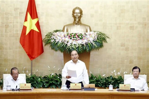 Премьер-министр Нгуен Суан Фук выступил на июльском очередном заседании Правительства. Фото: Тхонгнят ВИА