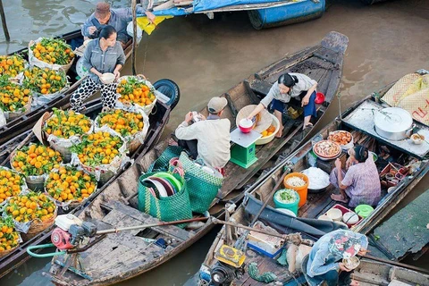 Плавучий рынок в городе Кантхо. (Фото: dulichvietnam.com.vn)