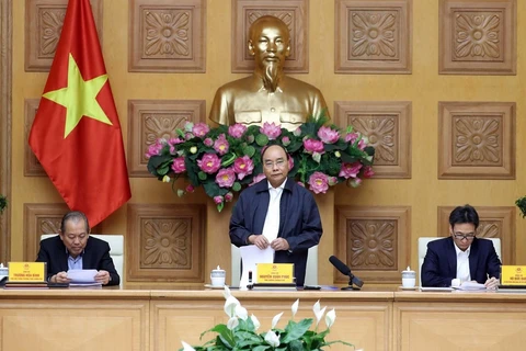 Премьер-министр Нгуен Суан Фук выступает на на рабочем заседании. (Фото: Тхонг Нят)