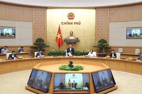 Премьер-министр Нгуен Суан Фук выступает на встрече. (Фото: ВИА)
