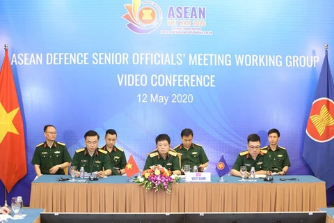 Вьетнамские делегаты присоединяются к видеоконференции (Фото: ВИA)