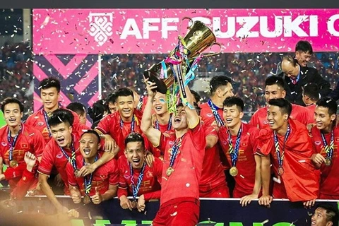 Игроки вьетнамской сборной празднуют победу на Кубке AFF 2018 года. (Фото: ВИА)