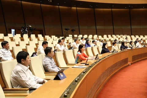 Законодатели на 9-й сессии НС 14-ого созыва в Ханое (Фото: ВИА) 