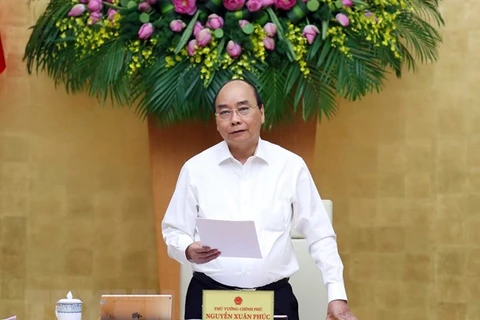 Премьер-министр Нгуен Суан Фук на заседании. (Фото: Тхонг Нят/ВИА)