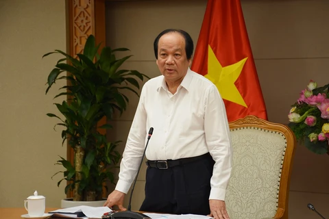 Министр и глава канцелярии правительства Май Тиен Зунг на встрече. (Фото: VGP)