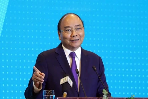 Премьер-министр Нгуен Суан Фук 27 июня выступает на конференции “Ханой-2020 - сотрудничество в области инвестиций и развития”. (Фото: ВИА)