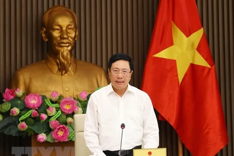 Заместитель премьер-министра и министр иностранных дел Фам Бинь Минь выступает на мероприятии (Фото: ВИА)