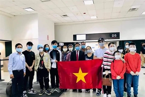 Граждане Вьетнама в аэропорту Хьюстона (Фото: ВИА)