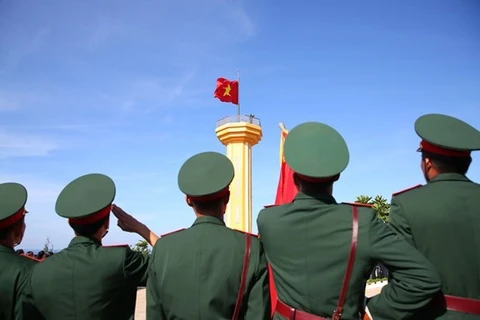 Церемония поднятия флага в островном районе Лишон (Фото: ВИА)
