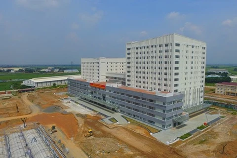 Здание для стационарного лечения областной больницы общего профиля Виньфук строится в срочном порядке и скоро будет сдано в эксплуатацию (Фото: baovinhphuc.com.vn)