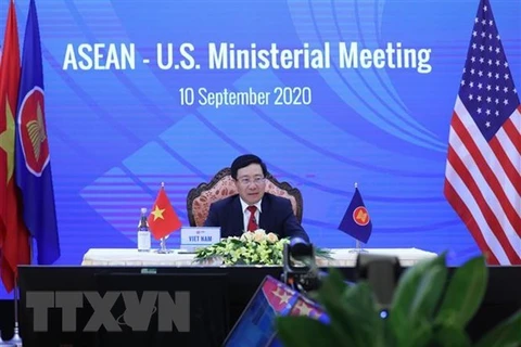 Заместитель премьер-министра и министр иностранных дел Вьетнама Фам Бинь Минь на встрече министров стран АСЕАН и США (Фото: ВИА)
