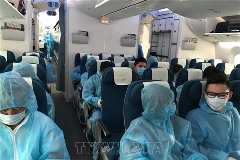Пассажиры рейса Vietnam Airlines (Фото: ВИА)