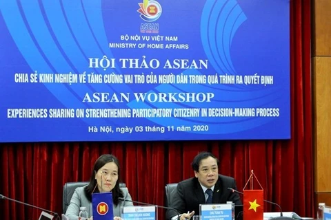 Директор Департамента международного сотрудничества Министерства внутренних дел Чу Туан Ту (справа) выступает на семинаре (Фото: ВИА)