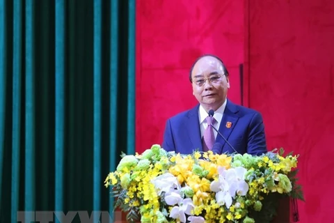 Премьер-министр Нгуен Суан Фук выступает на конференции. (Фото: ВИА)