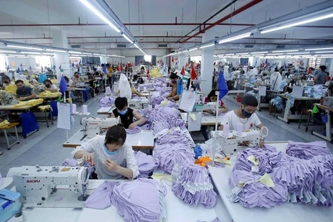 Рабочие текстильной компании на севере Вьетнама. (Фото: ВИА)