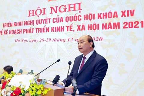 Премьер-министр Нгуен Суан Фук выступает на конференции (Источник: ВИА)