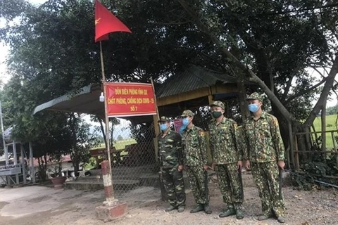Пограничники на пограничном пункте Виньжиа в провинции Аньзян (Фото любезно предоставлено пограничным пунктом Виньжа)
