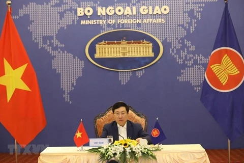 Заместитель премьер-министра, министр иностранных дел Фам Бинь Минь на мероприятии (Фото: ВИА)